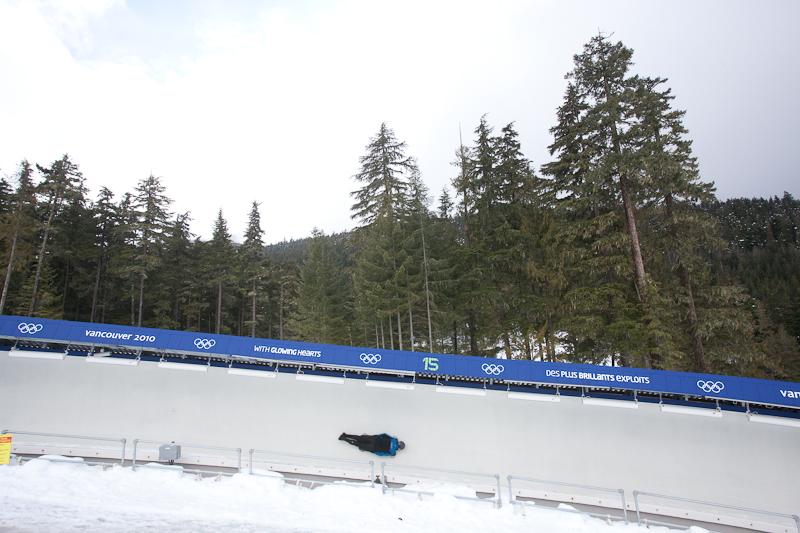 person doing skeleton on track