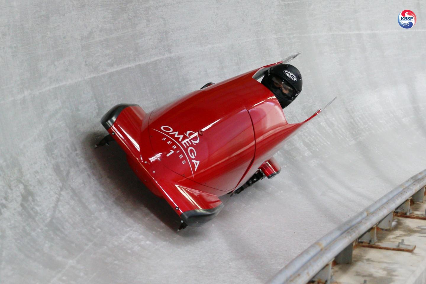 athlete in bobsled