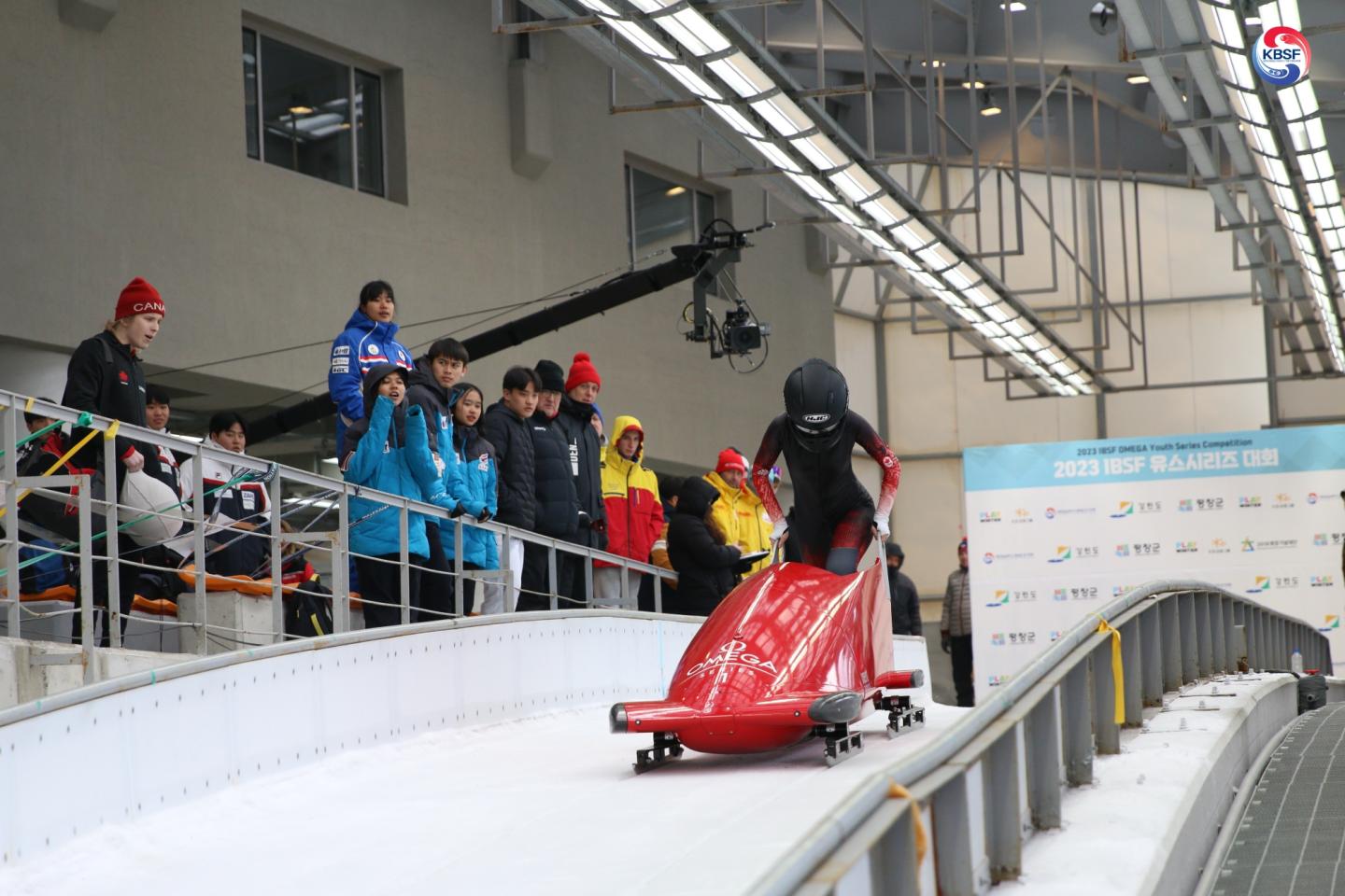athlete doing bobsleigh start