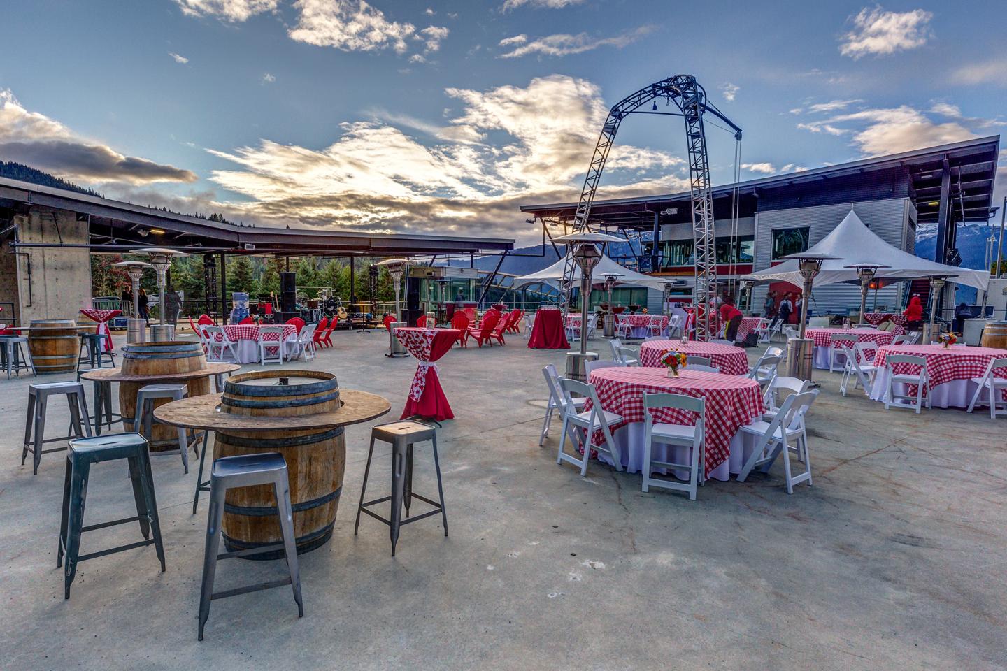 chairs and tables setup at outdoor venue in the mountains