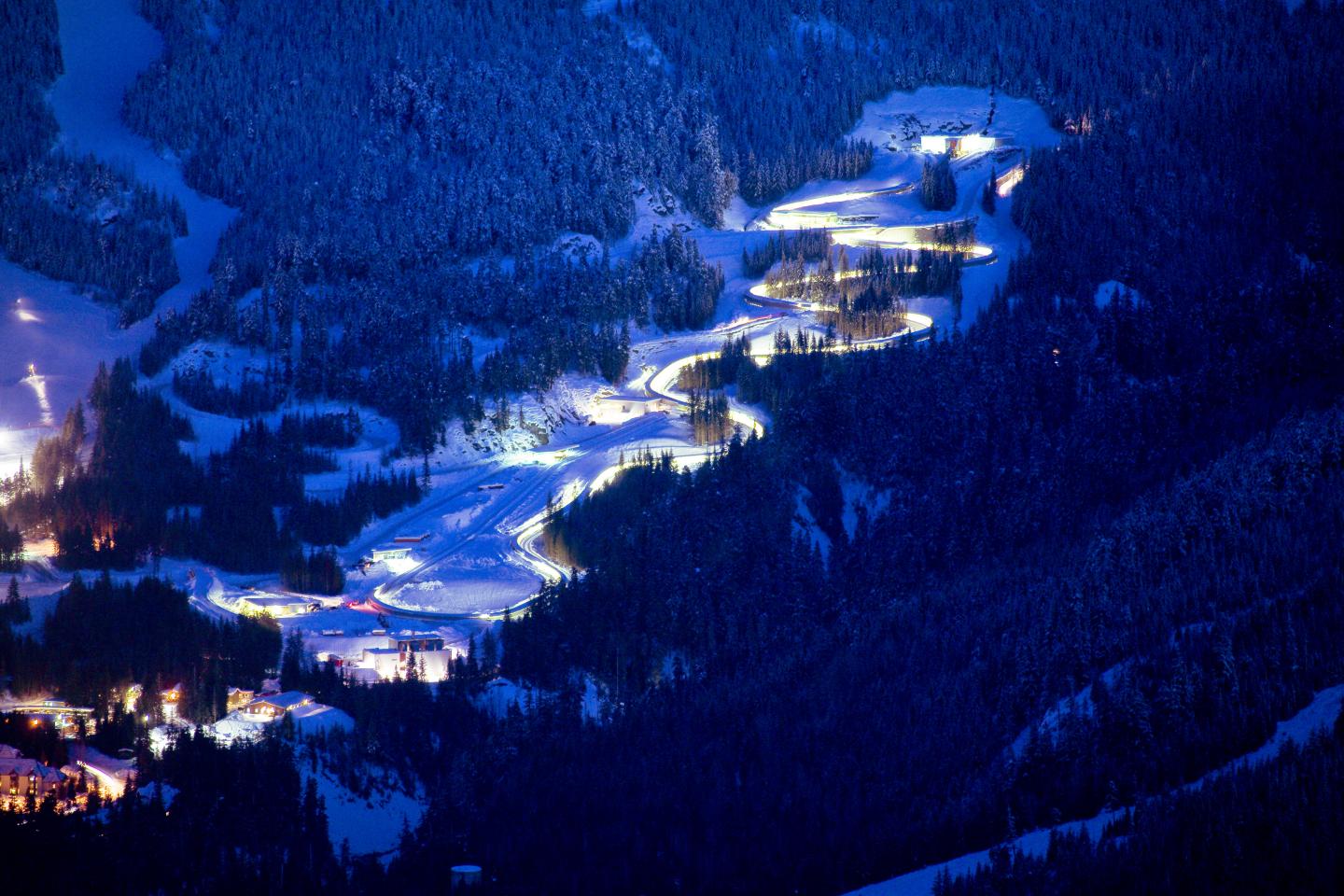 Whistler Sliding Centre lit up at night, aerial photo